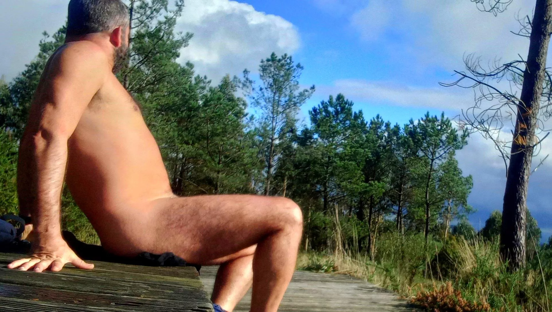 Sunbathing in the park posted by nakedbodyworld