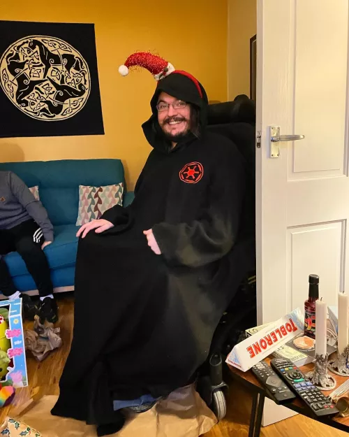 The true meaning of christmas is wearing the obligatory christmas accessory in every photo. by redoverthebed