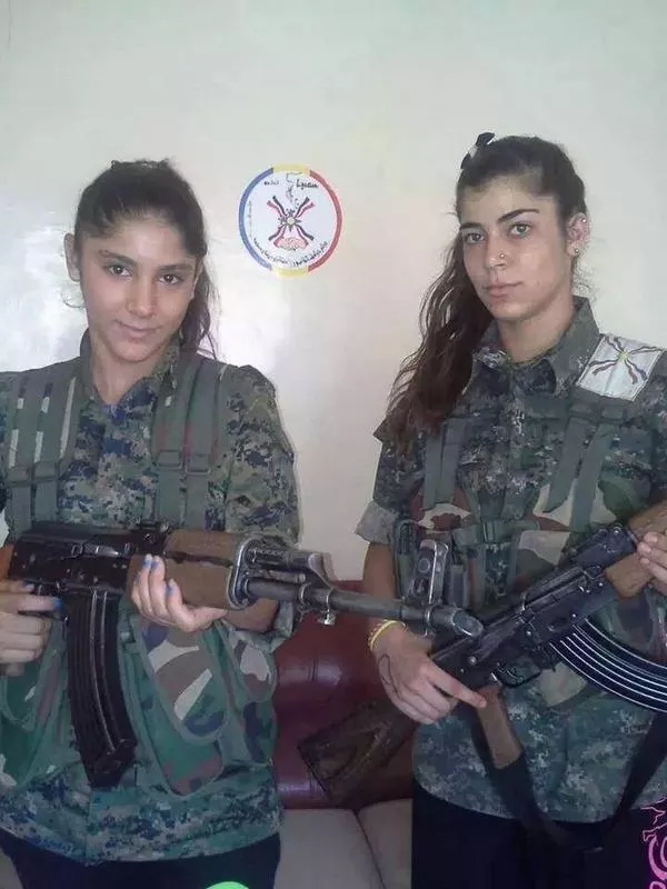 These two Kurdish babes can impose socialism on me anyday! posted by miraoister