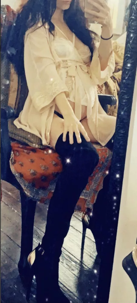 Thigh high boots on a pregnant Latina stripper by 13ScarlettH