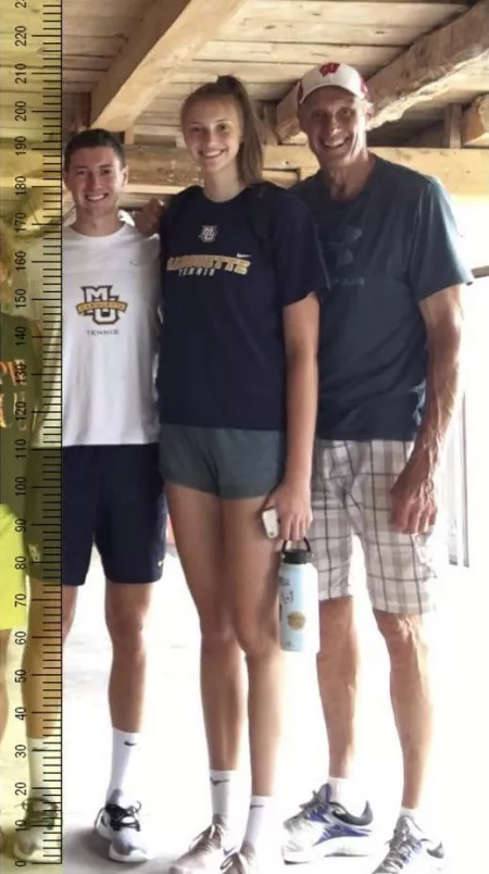 This guy is 6’4” and he is absolutely dwarfed by his 6’10” little sister and 7’0” father! by bsskfkd