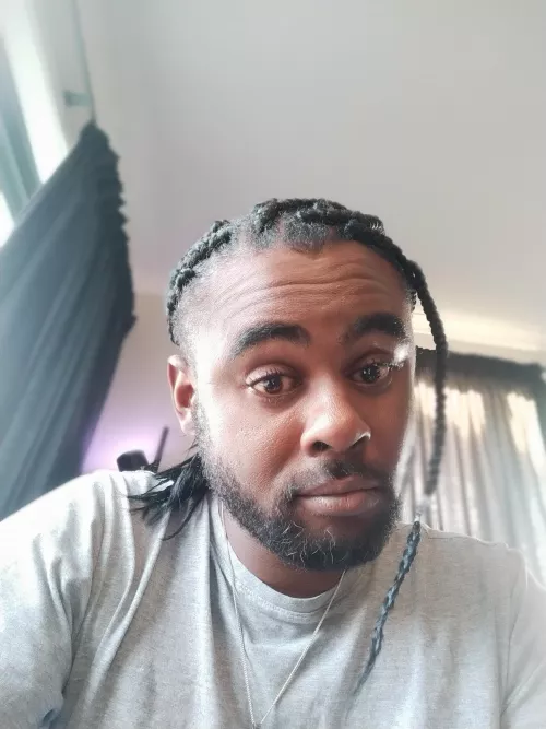 Trying out a new hairstyle! First time I've ever had braids by CaptainSpecific2439