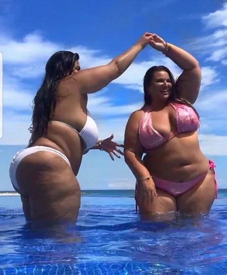 Two big bikini babes having fun in the pool by Udderluvr2020