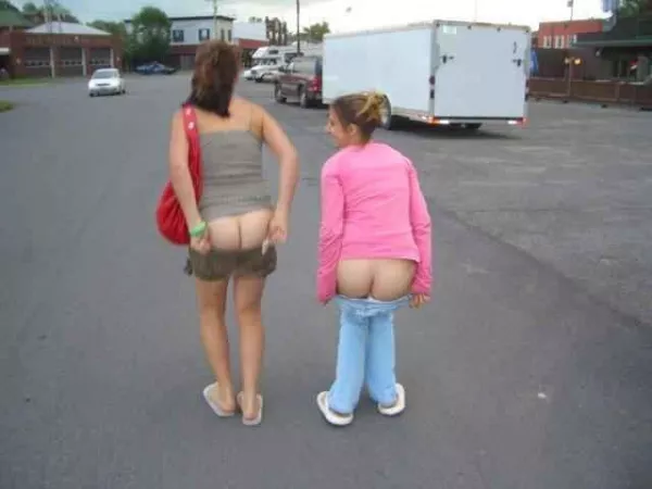 Two daring girls in the streets by [deleted]