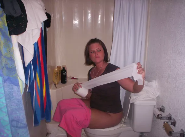 Two toilet paper holders... but both are empty (2 MiC) by CatpainTpyos