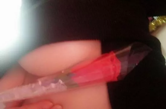 Underboob holding a rose posted by NSFWNightwood