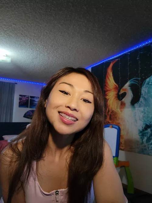 used to hide my smiles because I thought braces was too dorky. but now I think it's kinda cute 😁 by Asianpogogirl