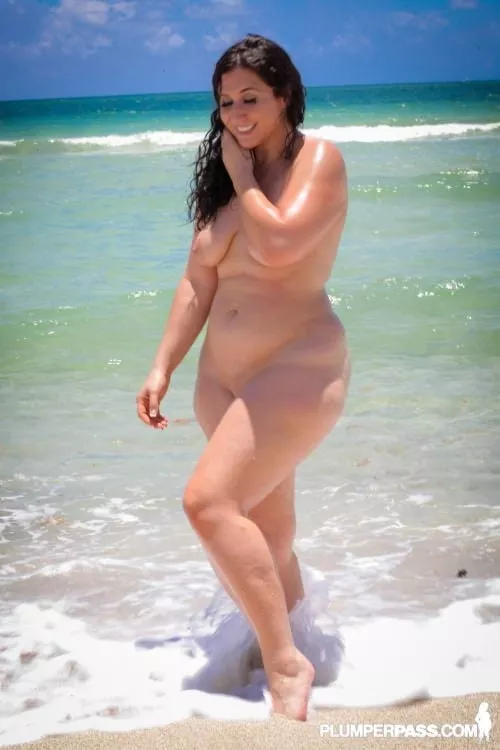 Vanessa Blake walking through the waves