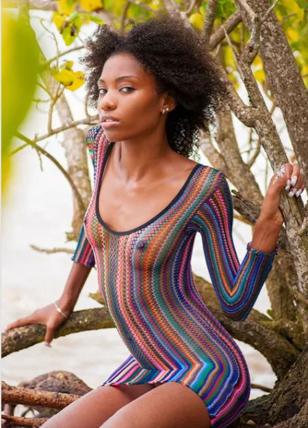 Vibrant rainbow fishnet dress by WhoredrobeMod