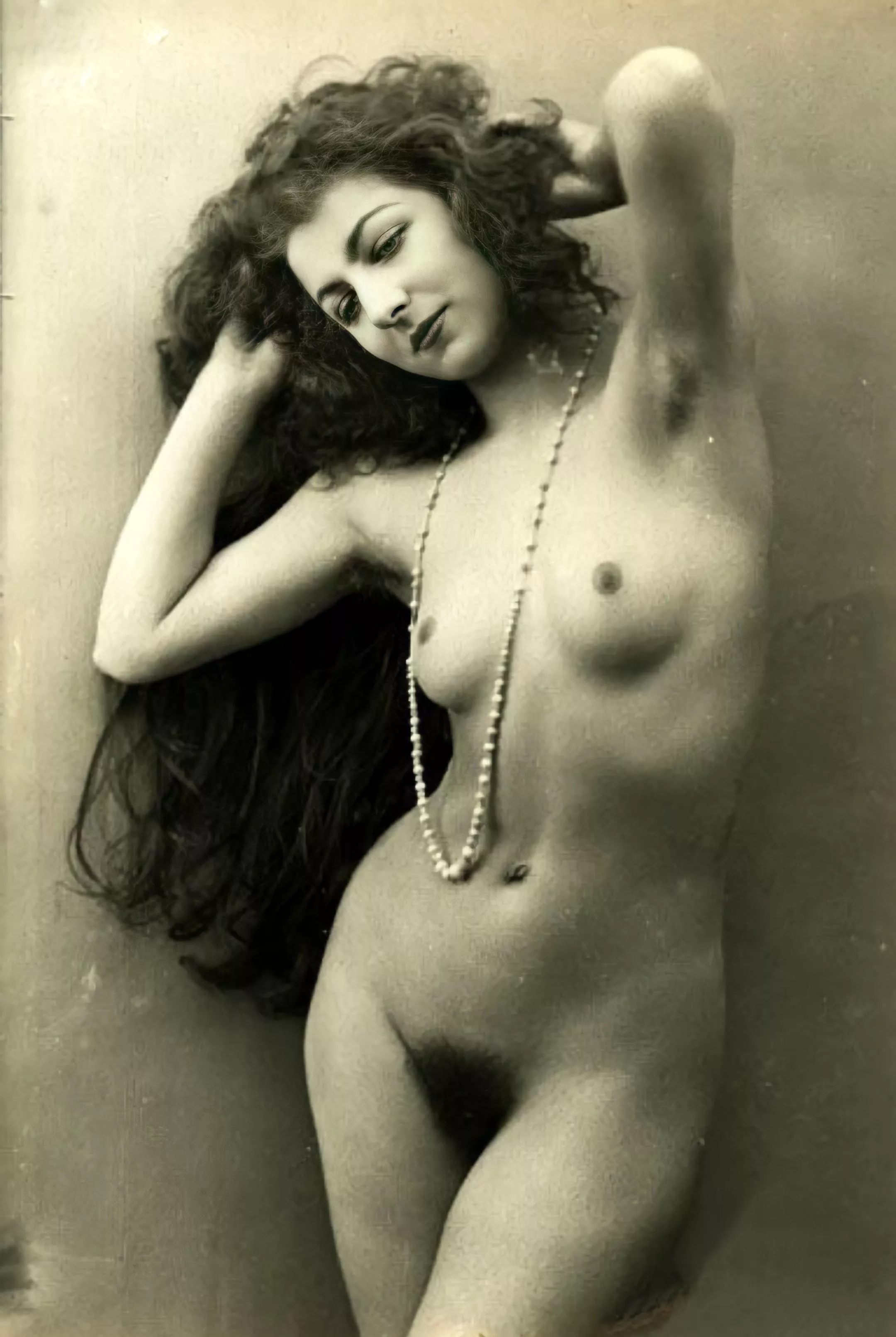 Vintage nude with long hair and pearls posted by [deleted]