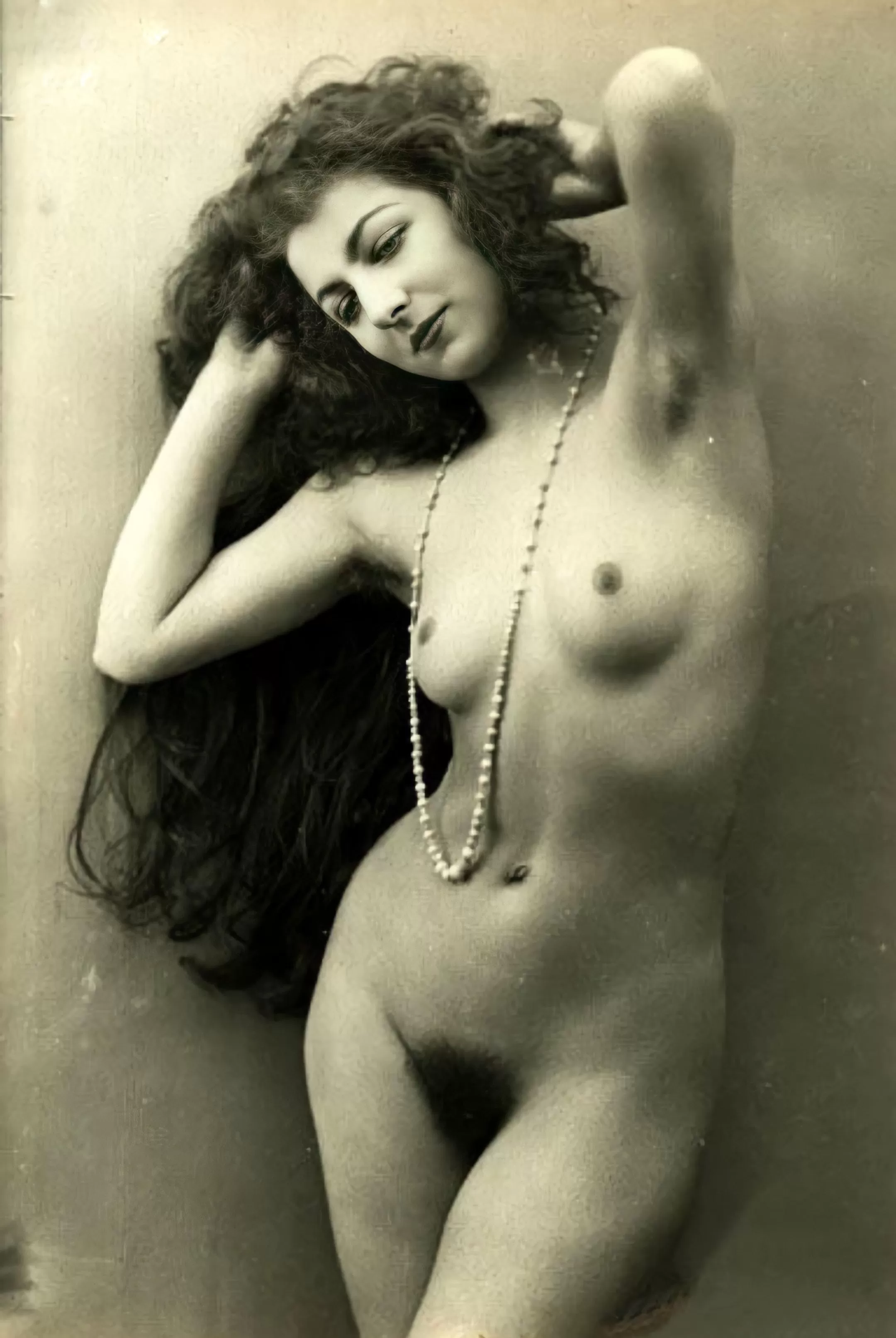 Vintage nude with long hair and pearls posted by [deleted]