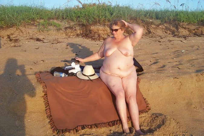 Wearing her favorite outfit at the beach by Udderluvr2020