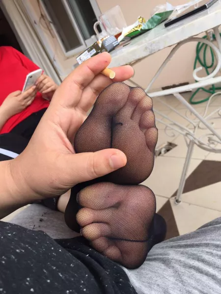 Weather is perfect so why not smoking cigarette while your girl’s nylon soles are on your lap. by dalakbuken