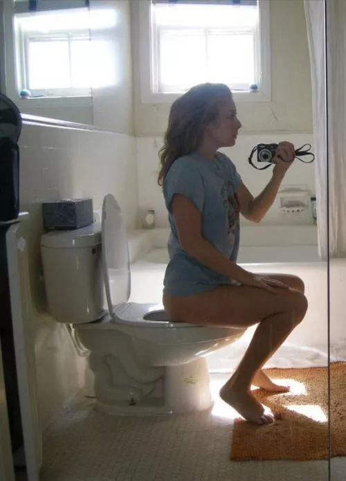 What a big mirror you have! All the better to watch you poop my dear. posted by Lee-Deep