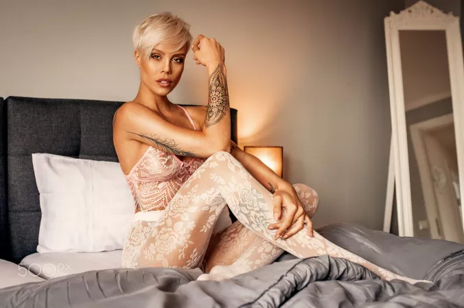 White Floral Pantyhose on a Bed by BOOOOOOOBIES