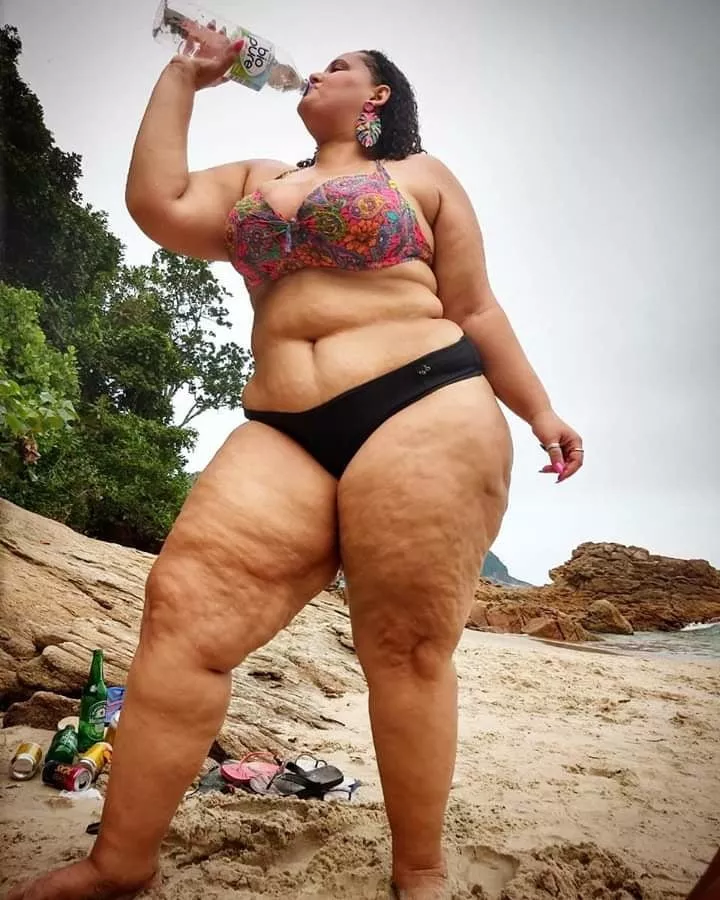 Woman Drinking A Soft Drink Has Cellulite On Her Thighs posted by thunderpants123