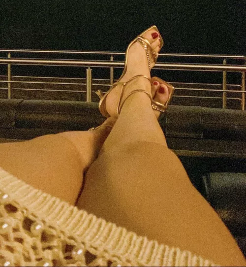Would you like to massage my feet at the movies? by GigiAndersen